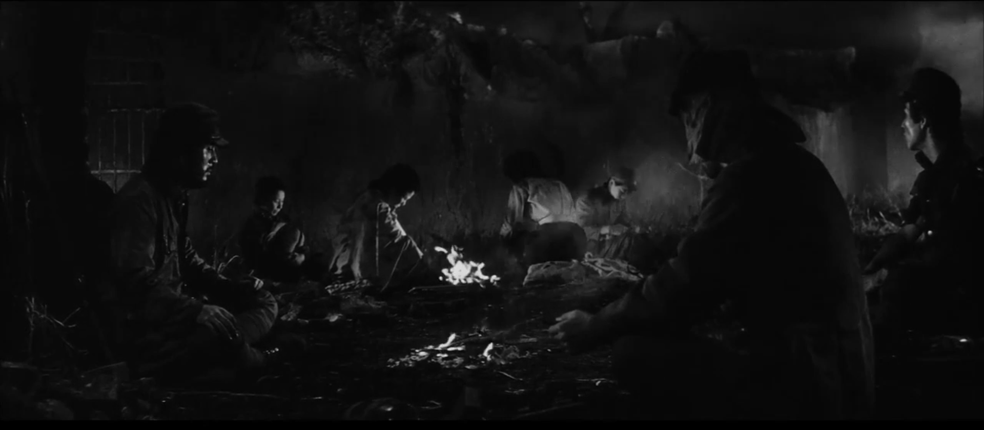 Refugees gathered around a fire